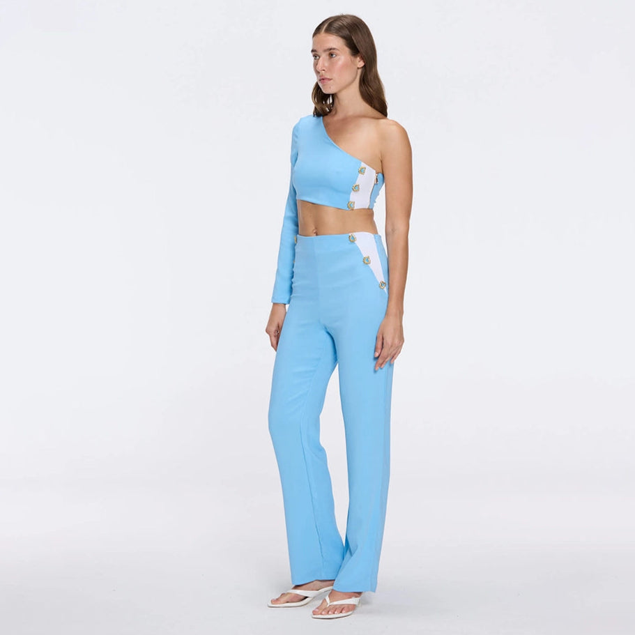 Villamar Blue-White Duo-Tone Gold Button One-Shoulder Crop Top | Moeva | RTW Bustiers | Each week unveils new pieces—luxury swimwear, fluid resort silhouettes, and elevated summer-to-evening essentials designed to carry you from coastal escapes to city nights.