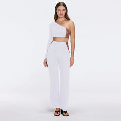Villamar White-Brown Duo-Tone Gold Button One-Shoulder Crop Top | Moeva | RTW Bustiers | Each week unveils new pieces—luxury swimwear, fluid resort silhouettes, and elevated summer-to-evening essentials designed to carry you from coastal escapes to city nights.