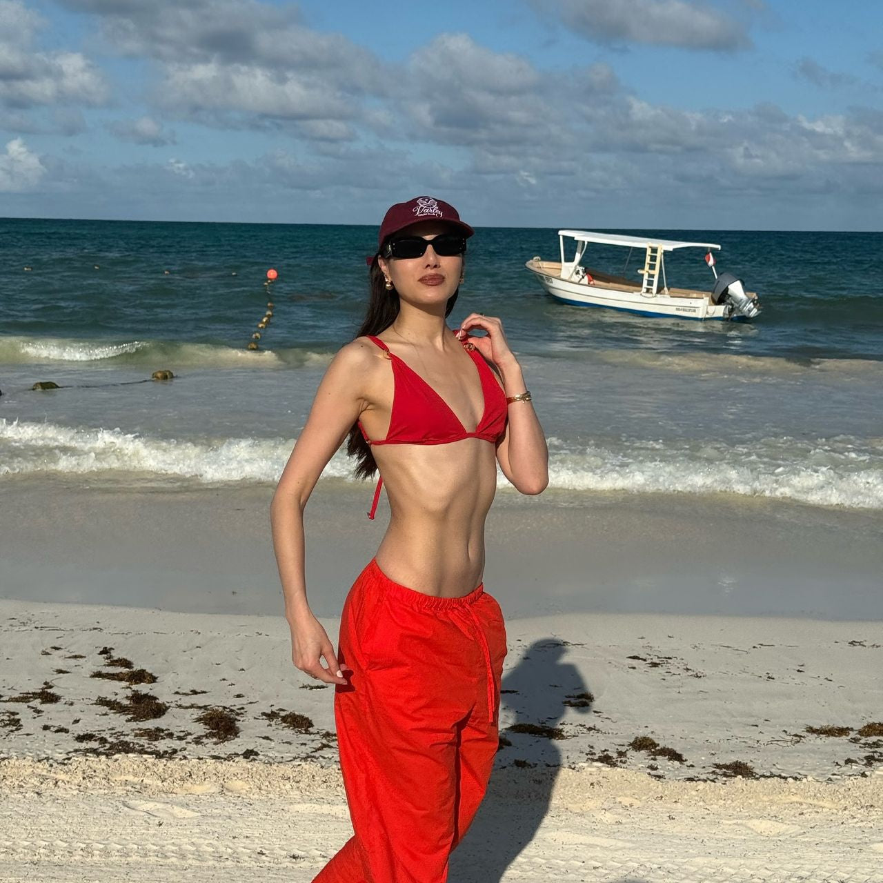 Natalie Lim Suarez - Zella Red Triangle Mid Coverage Solid Bikini Sets | Moeva | Bikini Set | Each week unveils new pieces—luxury swimwear, fluid resort silhouettes, and elevated summer-to-evening essentials designed to carry you from coastal escapes to city nights.