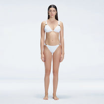 Zella White Triangle Mid Coverage Solid Bikini Sets | Moeva | Bikini Sets | Each week unveils new pieces—luxury swimwear, fluid resort silhouettes, and elevated summer-to-evening essentials designed to carry you from coastal escapes to city nights.