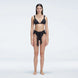 Zella Shiny Black Triangle Mid Coverage Solid Bikini Sets | Moeva | Bikini Sets | Each week unveils new pieces—luxury swimwear, fluid resort silhouettes, and elevated summer-to-evening essentials designed to carry you from coastal escapes to city nights.