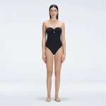 Zephyrine Black Bandeau Swimsuit | Moeva | One-Piece | Each week unveils new pieces—luxury swimwear, fluid resort silhouettes, and elevated summer-to-evening essentials designed to carry you from coastal escapes to city nights.