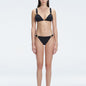 "Model wearing the Zella Black Bikini Set from the front view , featuring moderate coverage and a low waist fit."
