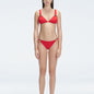 "Model wearing the Zella Red Bikini Set from the front view, featuring a personalized fit with removable padding."
