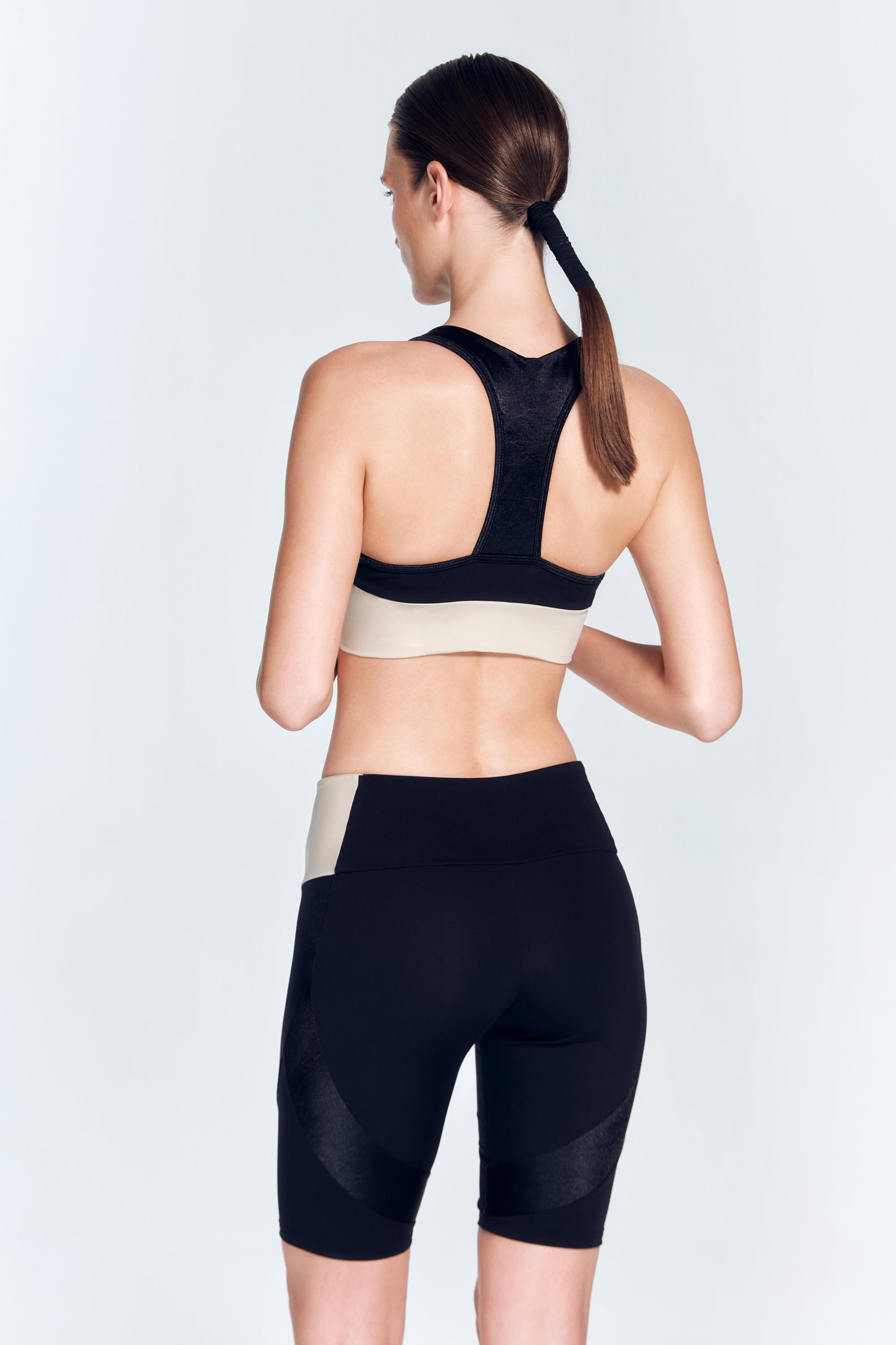 Arlette Black Sport Bra | Moeva | Sports Bras | Each week unveils new pieces—luxury swimwear, fluid resort silhouettes, and elevated summer-to-evening essentials designed to carry you from coastal escapes to city nights.