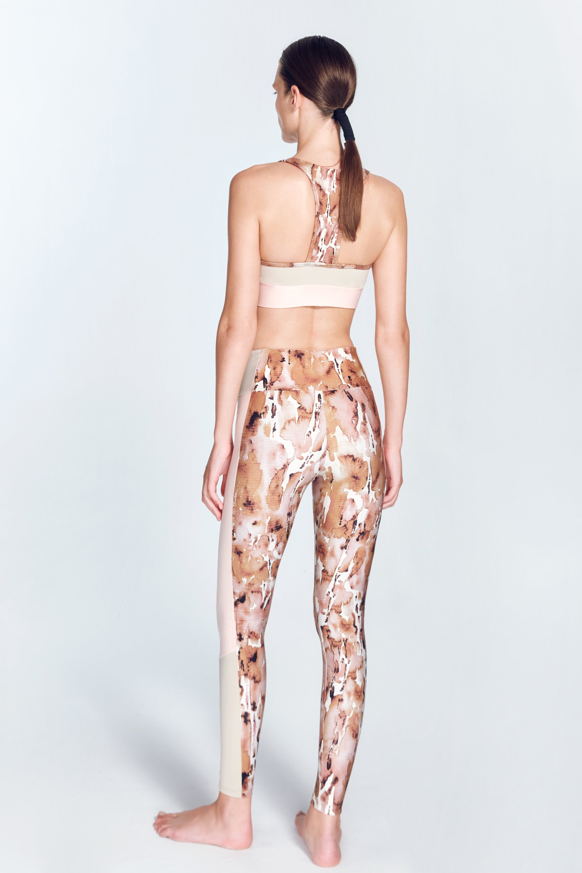Arlette Print Floral Abstract Sport Bra | Moeva | Sports Bras | Each week unveils new pieces—luxury swimwear, fluid resort silhouettes, and elevated summer-to-evening essentials designed to carry you from coastal escapes to city nights.