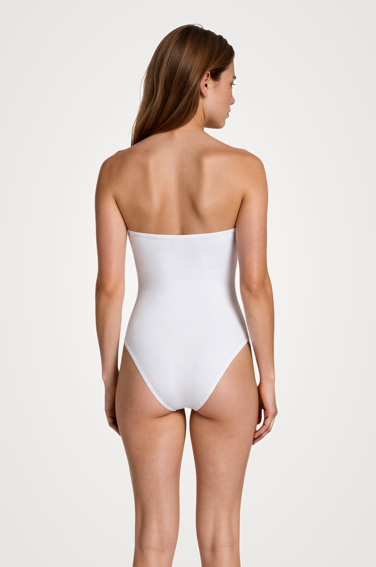 Lyvanna Strapless V-Neck Bonded White Swimsuit by Moeva | Swimsuit from MOEVA's luxury swimwear and resortwear collection, perfect for beach days, resort escapes and summer styling.