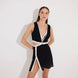 Blanca Black/White Asymmetric Mini Dress with Gold Button Detail | Moeva | Beachwear Dresses | Each week unveils new pieces—luxury swimwear, fluid resort silhouettes, and elevated summer-to-evening essentials designed to carry you from coastal escapes to city nights.