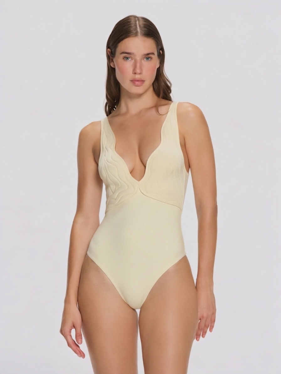 Breena Yellow V Neck Textured One Piece Swimsuit | Moeva | Swimsuit | Each week unveils new pieces—luxury swimwear, fluid resort silhouettes, and elevated summer-to-evening essentials designed to carry you from coastal escapes to city nights.