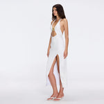 Serres Satin White Halter Maxi Dress with Cut-Out and Gold Detail | Moeva | Dress | Each week unveils new pieces—luxury swimwear, fluid resort silhouettes, and elevated summer-to-evening essentials designed to carry you from coastal escapes to city nights.
