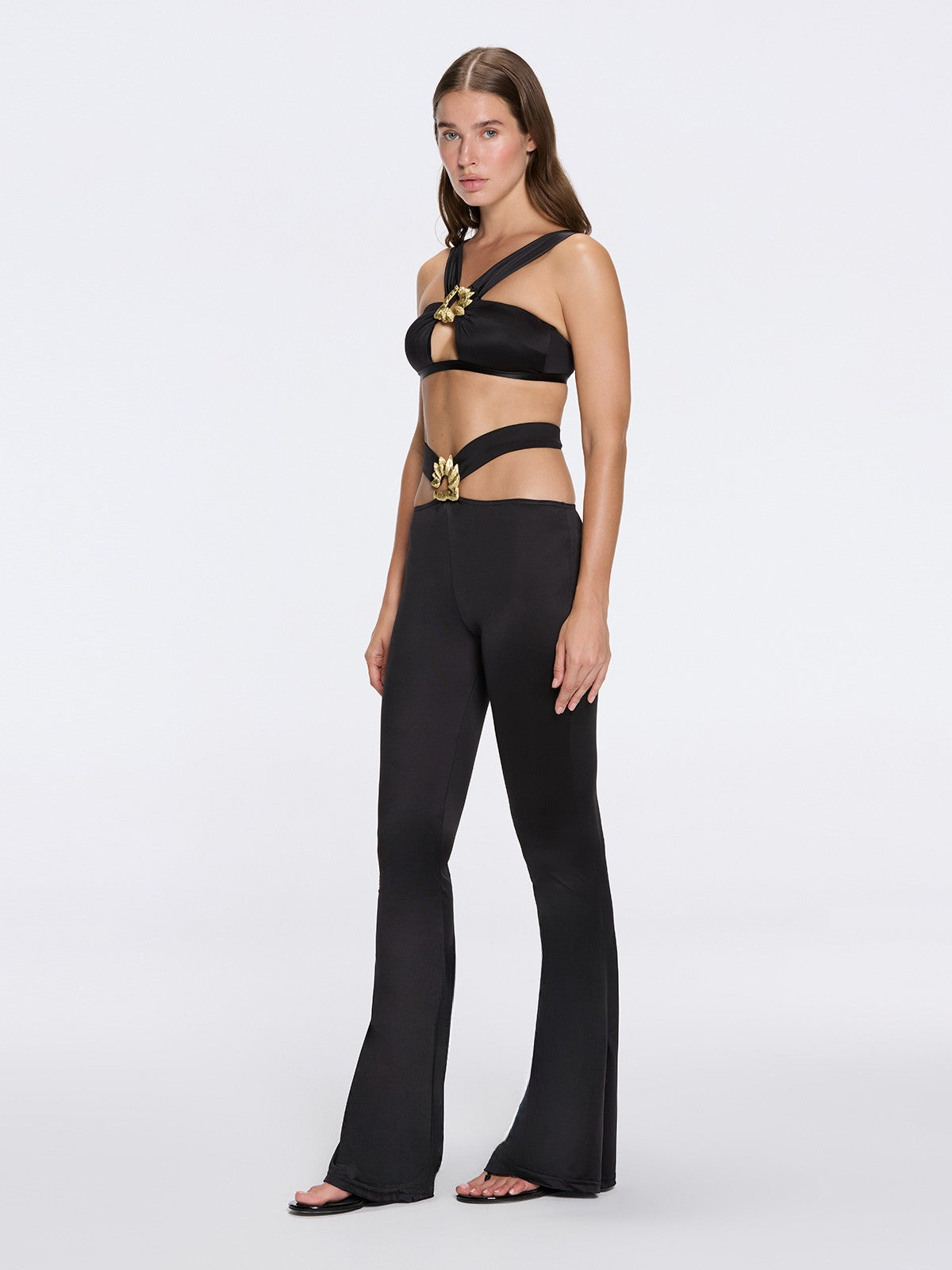 Gwyneth High-Waist with Gold Detail Satin Flare Black Pants | Moeva | Pants | Each week unveils new pieces—luxury swimwear, fluid resort silhouettes, and elevated summer-to-evening essentials designed to carry you from coastal escapes to city nights.