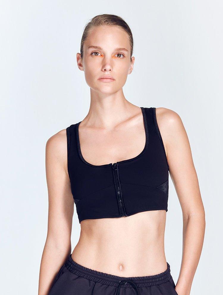 "Front view of a model wearing the Fanny Sports Bra, showcasing its square neck and modern design."