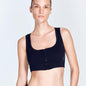 "Front view of a model wearing the Fanny Sports Bra, showcasing its square neck and modern design."