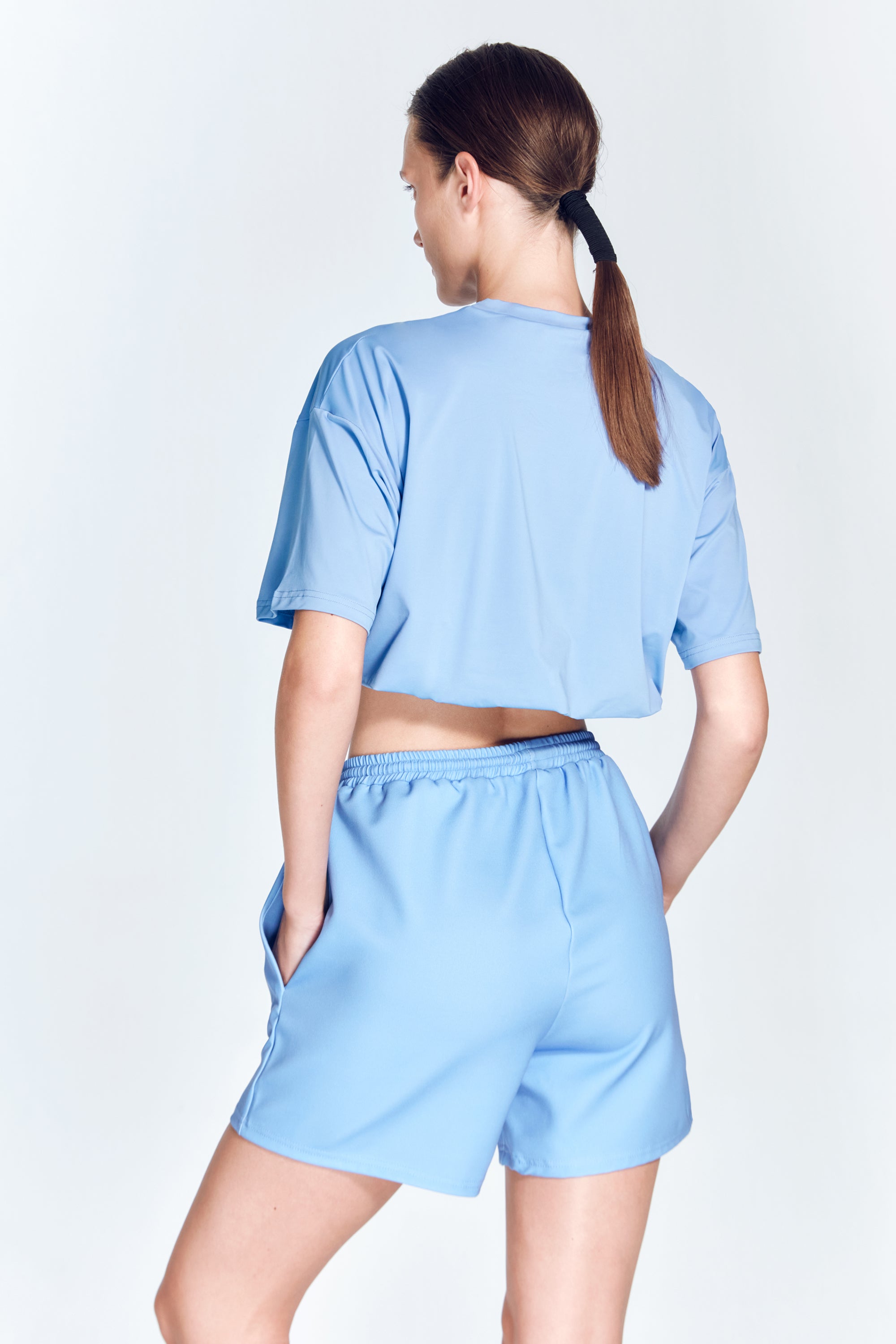 Linette Blue Shorts | Moeva | Activewear | Each week unveils new pieces—luxury swimwear, fluid resort silhouettes, and elevated summer-to-evening essentials designed to carry you from coastal escapes to city nights.
