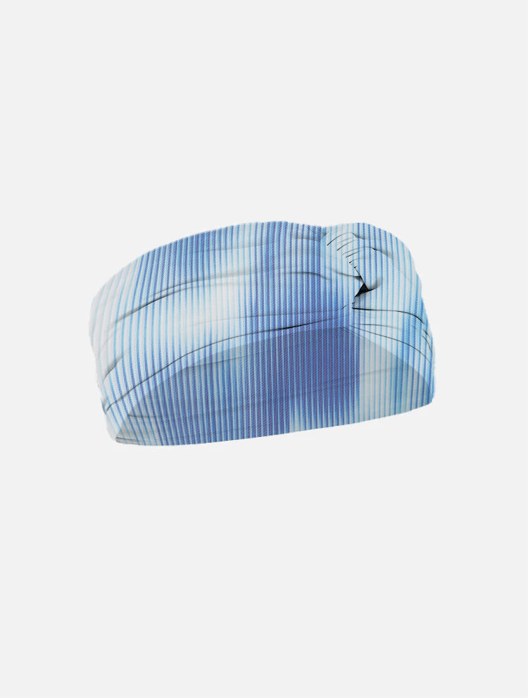 Josie Blue Degraded Headband laid flat, showcasing the fast-dry swimwear fabric and stylish blue gradient.
