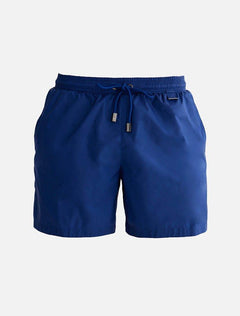 "Decoupage image of Louis dark blue mid-thigh length men's swim shorts by Moeva, showcasing multiple angles and features. Highlighting the ultra-light, quick-dry fabric, elastic waistband, drawstrings with black nickel stoppers, and Moeva patch. Ideal for creating an elegant beachside look."