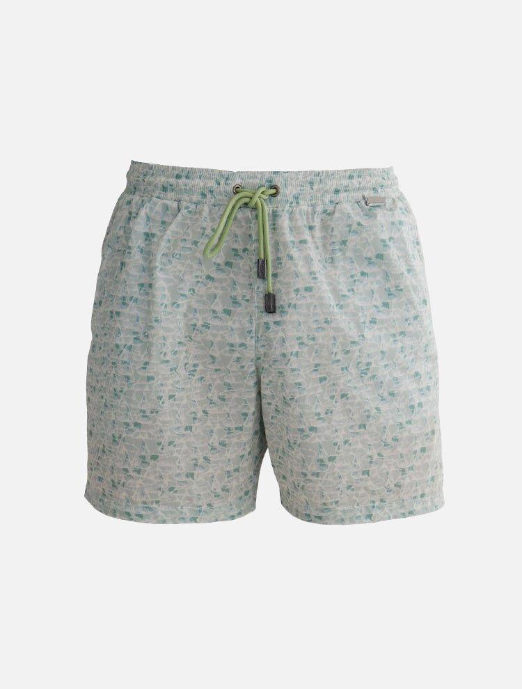 "Decoupage image of Louis Green Abstract ultralight men's swim shorts by Moeva, showcasing multiple angles and details. Highlighting the unique abstract pattern, elastic waistband, drawstrings with black nickel stoppers, and Moeva patch. Perfect for stylish and comfortable beachwear."