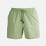 "Decoupage image of Louis mint green mid-thigh length men's swim shorts by Moeva, showcasing multiple angles and details. Highlighting the ultra-light, quick-dry fabric, elastic waistband, drawstrings with black nickel stoppers, Moeva patch, and two open pockets. Perfect for creating a stylish and comfortable beachside look."