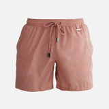 Alt text for decoupage image: "Decoupage image of Louis Old Rose ultralight men's swim shorts by Moeva, showcasing multiple angles and details. Highlighting the ultra-light, quick-dry fabric, elastic waistband, drawstrings with black nickel stoppers, Moeva patch, and two open pockets. Perfect for creating a stylish and comfortable beachside look."