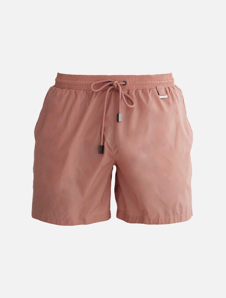 Alt text for decoupage image: "Decoupage image of Louis Old Rose ultralight men's swim shorts by Moeva, showcasing multiple angles and details. Highlighting the ultra-light, quick-dry fabric, elastic waistband, drawstrings with black nickel stoppers, Moeva patch, and two open pockets. Perfect for creating a stylish and comfortable beachside look."