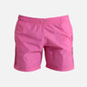 "Decoupage image of Louis pink mid-thigh length men's swim shorts by Moeva, showcasing multiple angles and details. Highlighting the ultra-light, quick-dry fabric, elastic waistband, drawstrings with black nickel stoppers, Moeva patch, and two open pockets. Perfect for creating a stylish and comfortable beachside look."