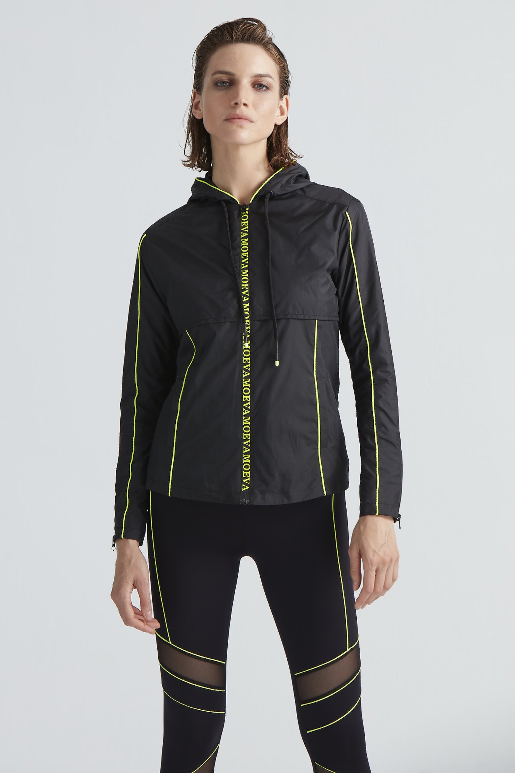 Morgan Black/Neon Yellow Jacket | Moeva | Activewear | Each week unveils new pieces—luxury swimwear, fluid resort silhouettes, and elevated summer-to-evening essentials designed to carry you from coastal escapes to city nights.