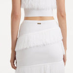 Arlo White Fringe Detail Asymmetric Mini Skirt | Moeva | RTW Skirts | Each week unveils new pieces—luxury swimwear, fluid resort silhouettes, and elevated summer-to-evening essentials designed to carry you from coastal escapes to city nights.