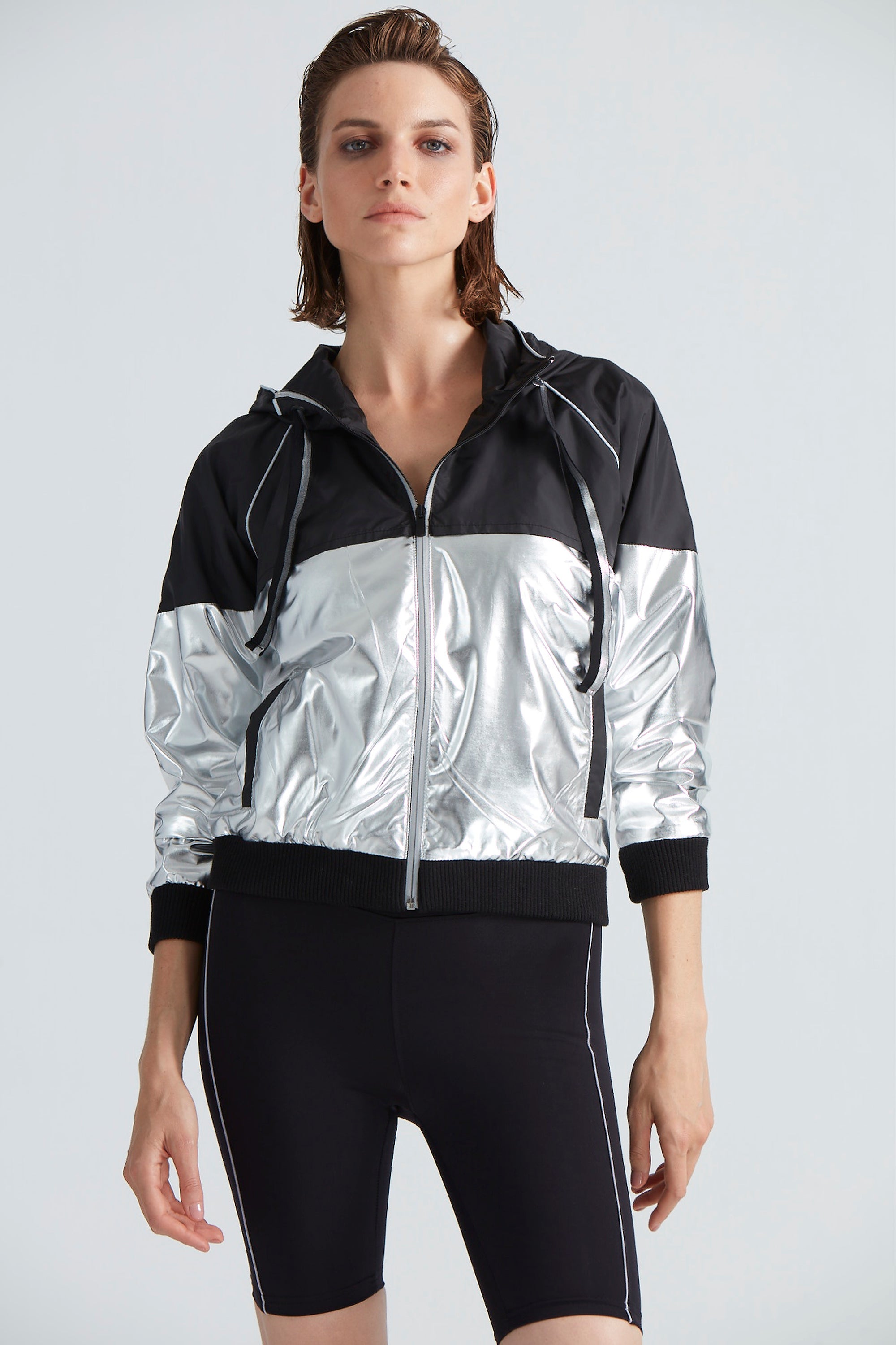 Parker Black/Silver Jacket | Moeva | Activewear | Each week unveils new pieces—luxury swimwear, fluid resort silhouettes, and elevated summer-to-evening essentials designed to carry you from coastal escapes to city nights.