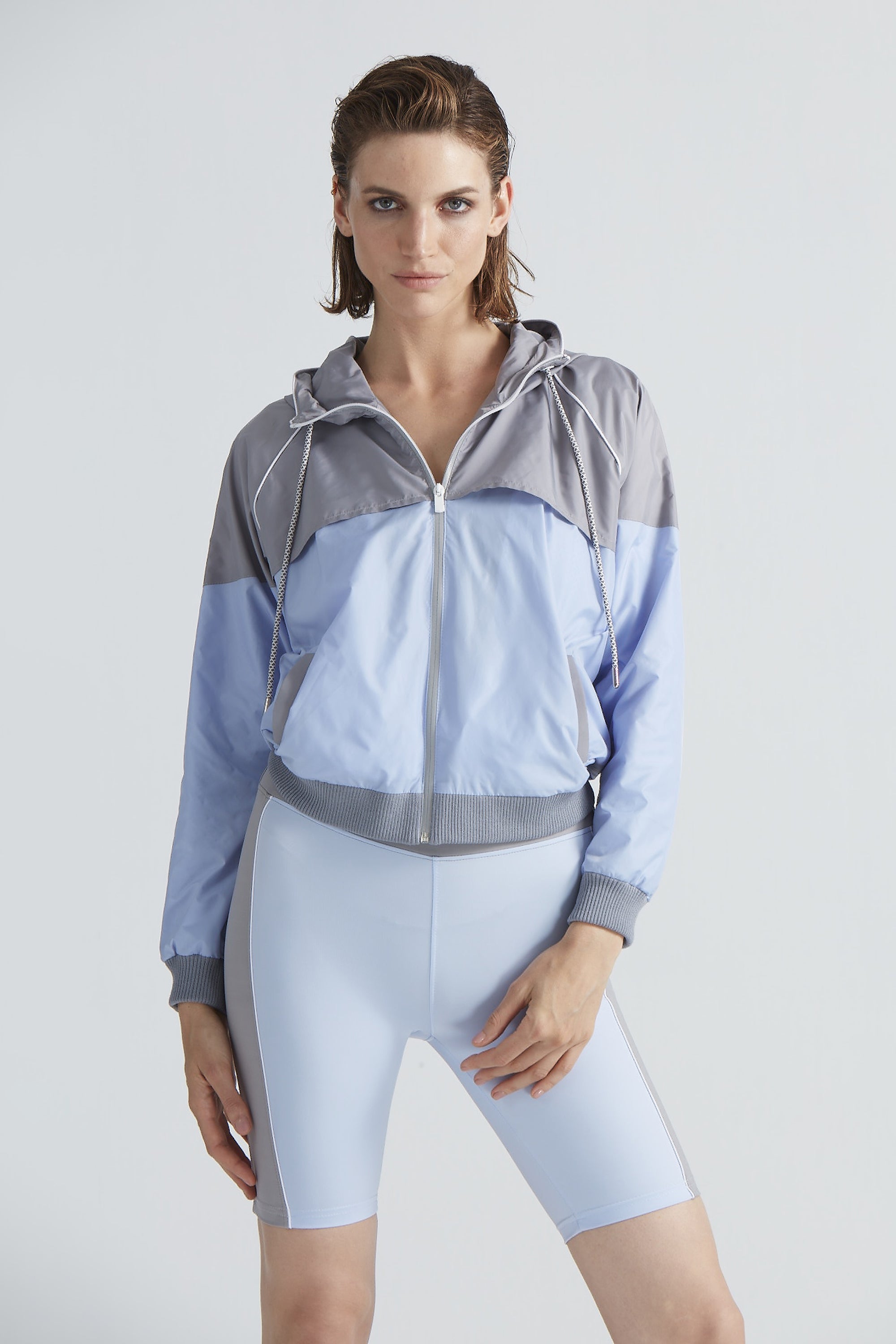 Parker Grey/Blue Jacket | Moeva | Activewear | Each week unveils new pieces—luxury swimwear, fluid resort silhouettes, and elevated summer-to-evening essentials designed to carry you from coastal escapes to city nights.