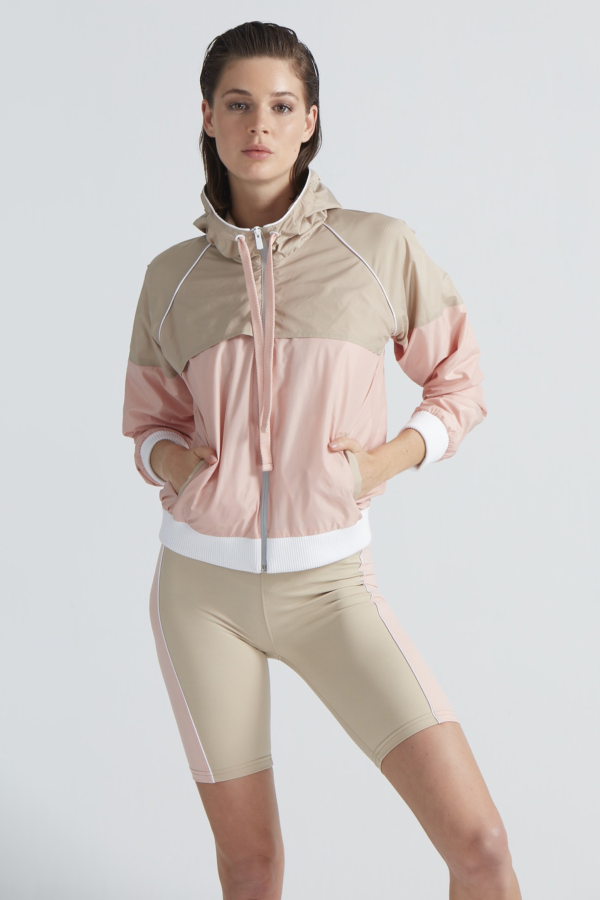 Parker Beige/Pink Jacket | Moeva | Activewear | Each week unveils new pieces—luxury swimwear, fluid resort silhouettes, and elevated summer-to-evening essentials designed to carry you from coastal escapes to city nights.