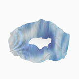 Peggy Blue Degraded Scrunchie laid flat, displaying the soft texture and stretchy swimwear fabric.
