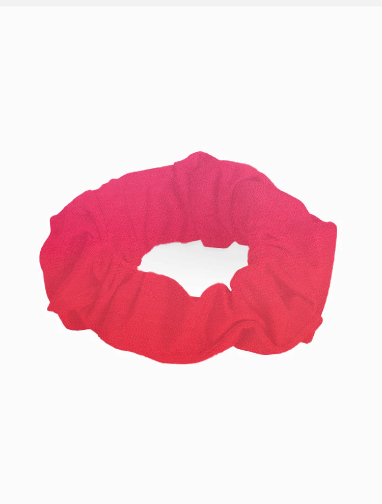 Peggy Red Gradient Scrunchie laid flat, displaying the vibrant red gradient and soft swimwear fabric.
