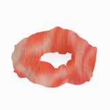 Peggy Red Degraded Scrunchie laid flat, showcasing the vibrant red gradient and soft swimwear fabric.
