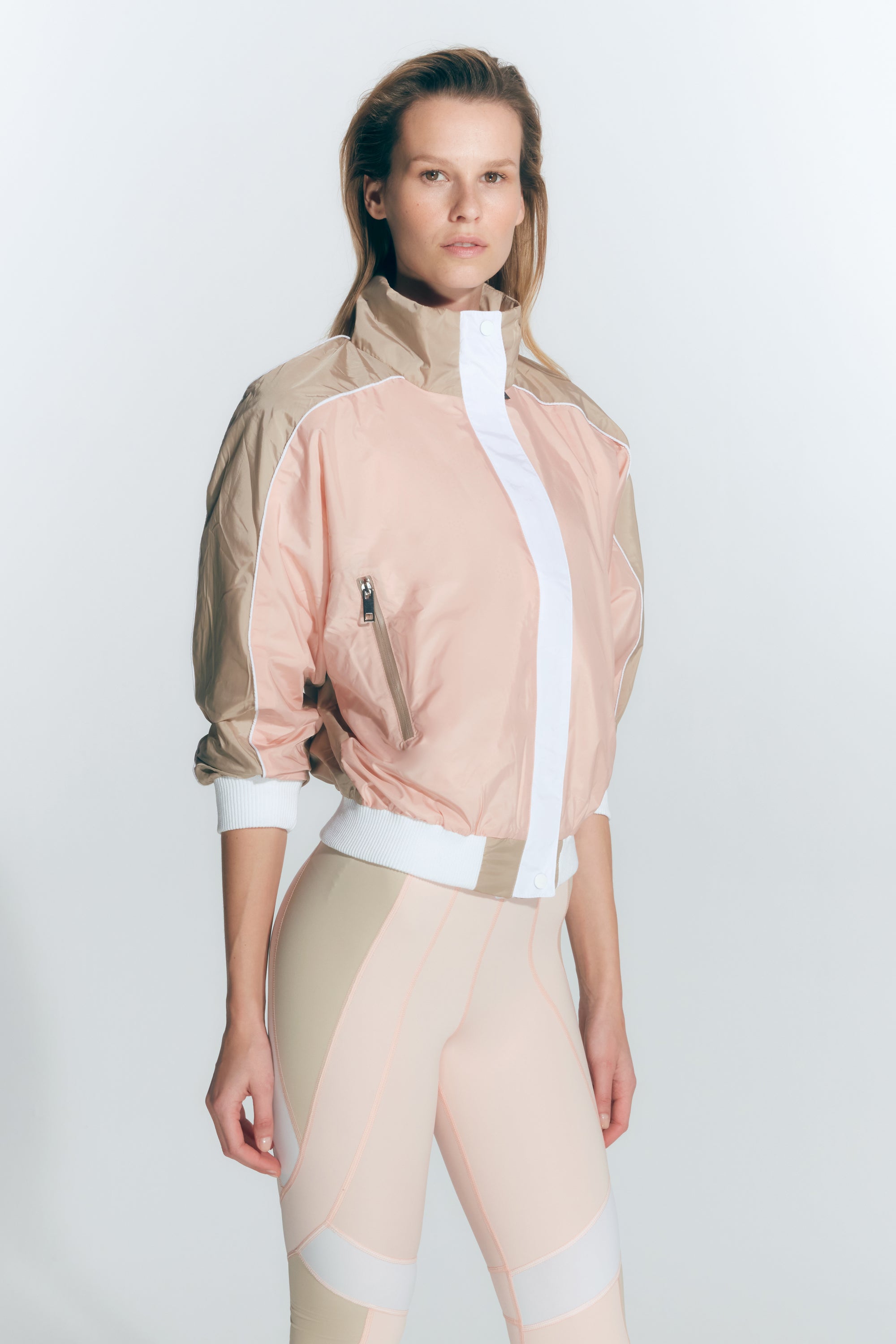 Pixie Pink/Nude/White Jacket | Moeva | Activewear | Each week unveils new pieces—luxury swimwear, fluid resort silhouettes, and elevated summer-to-evening essentials designed to carry you from coastal escapes to city nights.