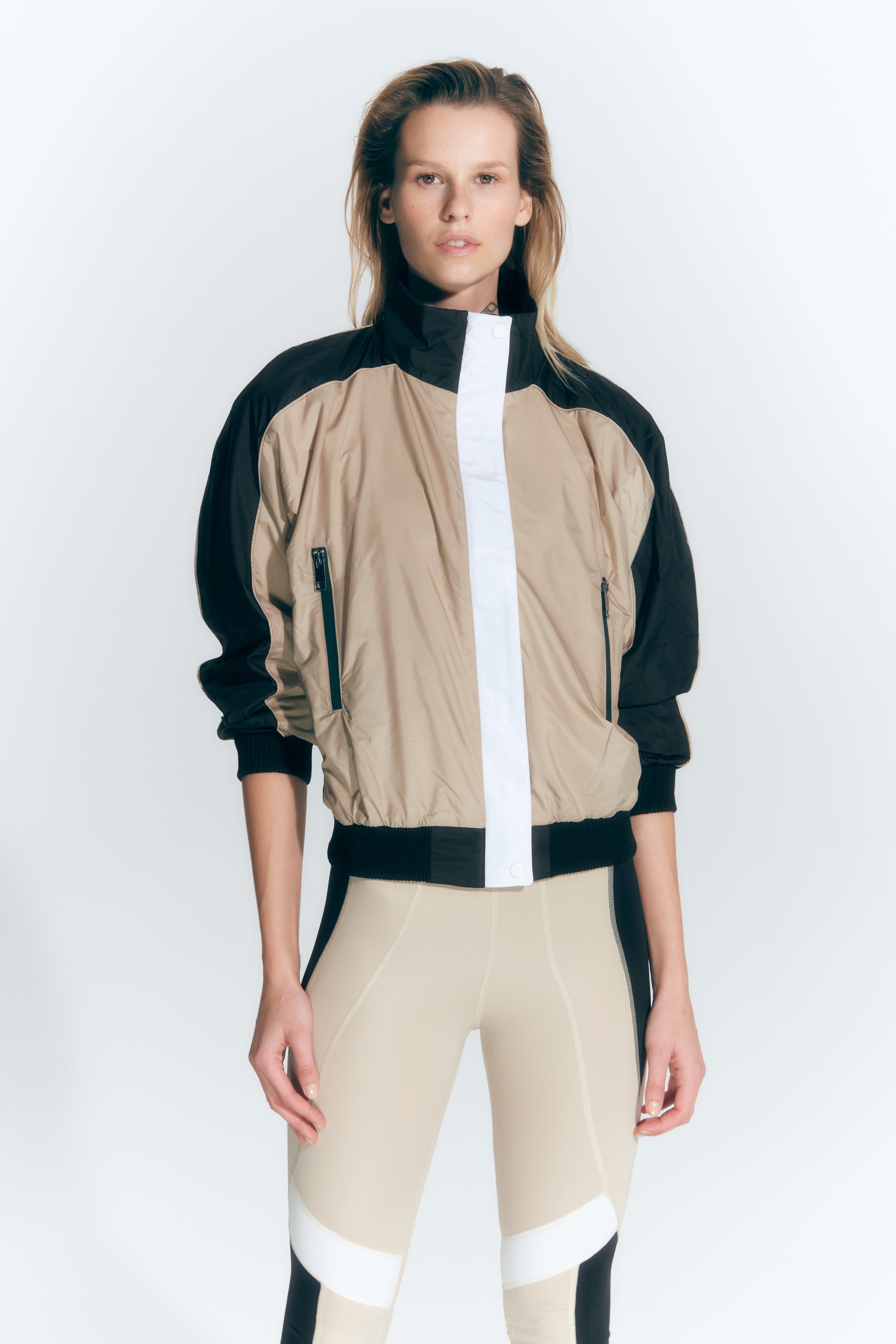 Pixie Black/Nude/White Jacket | Moeva | Activewear | Each week unveils new pieces—luxury swimwear, fluid resort silhouettes, and elevated summer-to-evening essentials designed to carry you from coastal escapes to city nights.