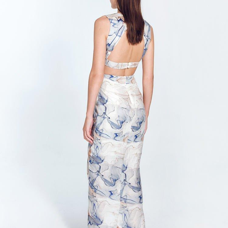 Adelice Blue Abstract V-Neck Maxi Dress with Front Slit | Moeva | Dress | Each week unveils new pieces—luxury swimwear, fluid resort silhouettes, and elevated summer-to-evening essentials designed to carry you from coastal escapes to city nights.