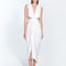 "Front view of Adelice white dress with deep V neckline, center ruching, asymmetrical skirt, high front slit, and side cutouts."