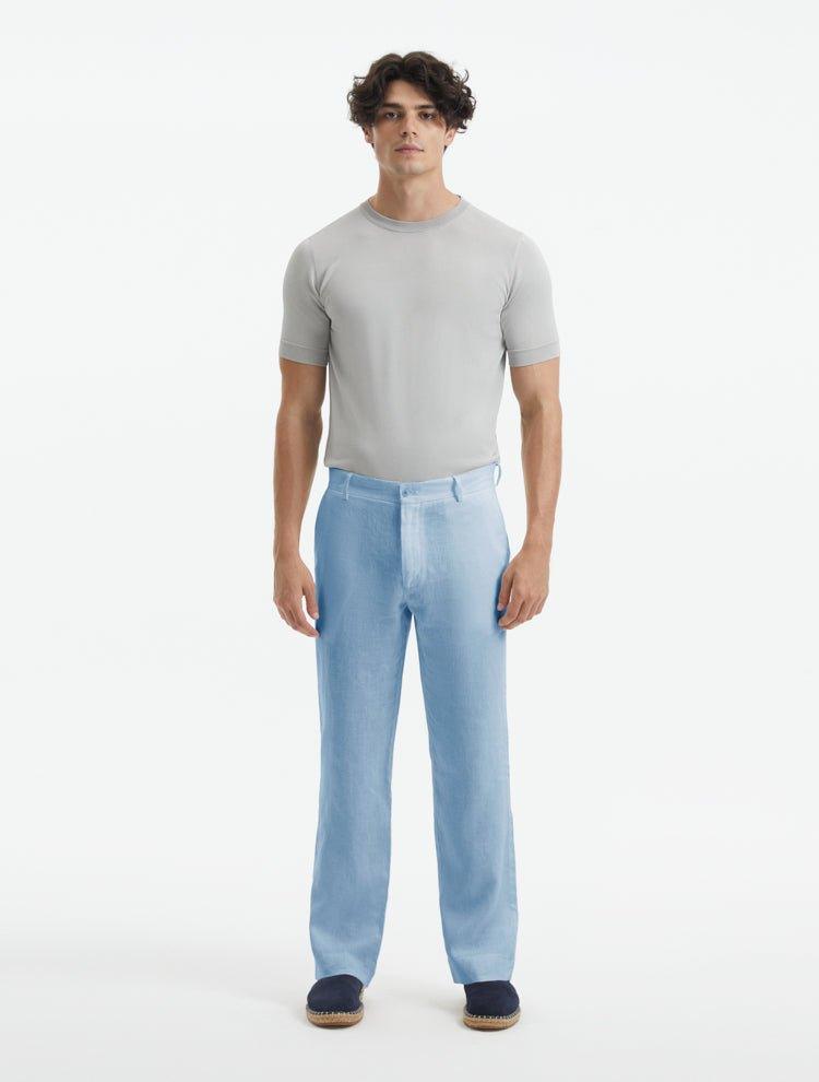 Front view of the model wearing Adrian Baby Blue Pants, highlighting the slim-fit design and high-rise waist that provides a stylish and comfortable look.