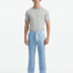 Front view of the model wearing Adrian Baby Blue Pants, highlighting the slim-fit design and high-rise waist that provides a stylish and comfortable look.