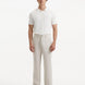 Front view of the model in Adrian Beige Pants, highlighting the elegant design, comfortable fit, and modern ankle-length cut.