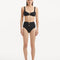 Model wearing the Adva Black Bikini Top, highlighting the elegant balconette design and shell accents.