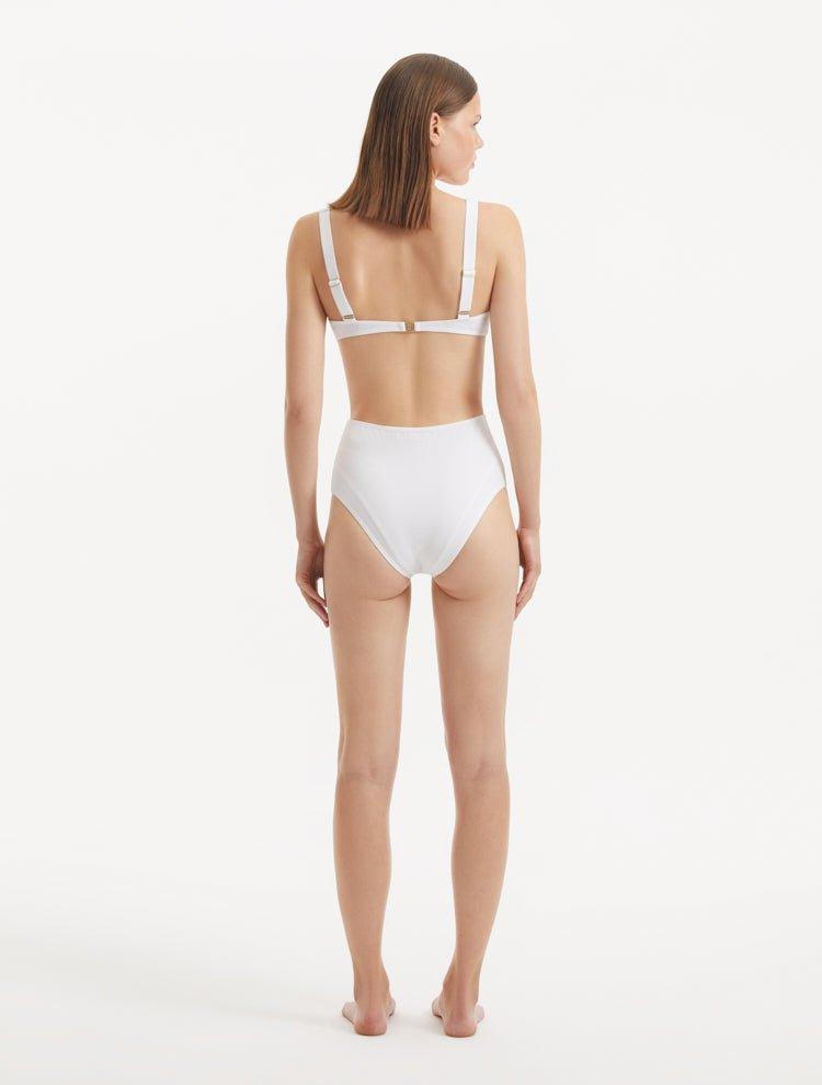 Rear view of the Adva White Bikini Bottom, emphasizing the elegant fit and luxurious fabric.