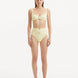  Rear view of the Adva Yellow Bikini Bottom, highlighting its vibrant yellow color and elegant silhouette.