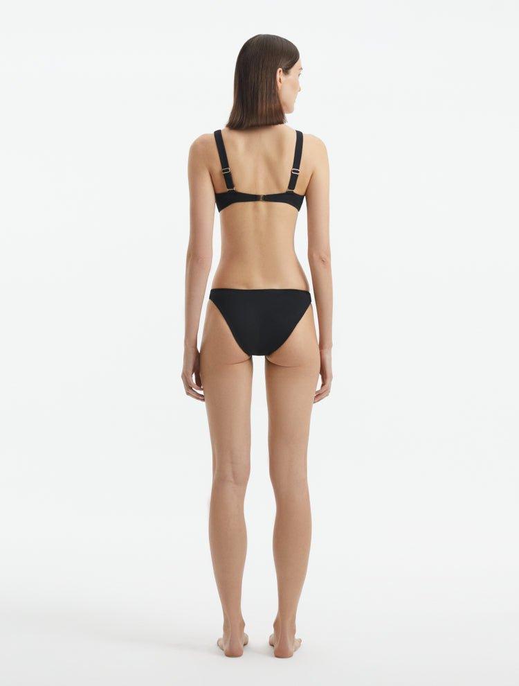 Rear view of the Aeron Black Bikini Bottom, highlighting the elegant cut and luxurious Italian fabric.