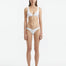  Aeron White Bikini Bottom with hipster design, featuring shell-shaped gold button details.