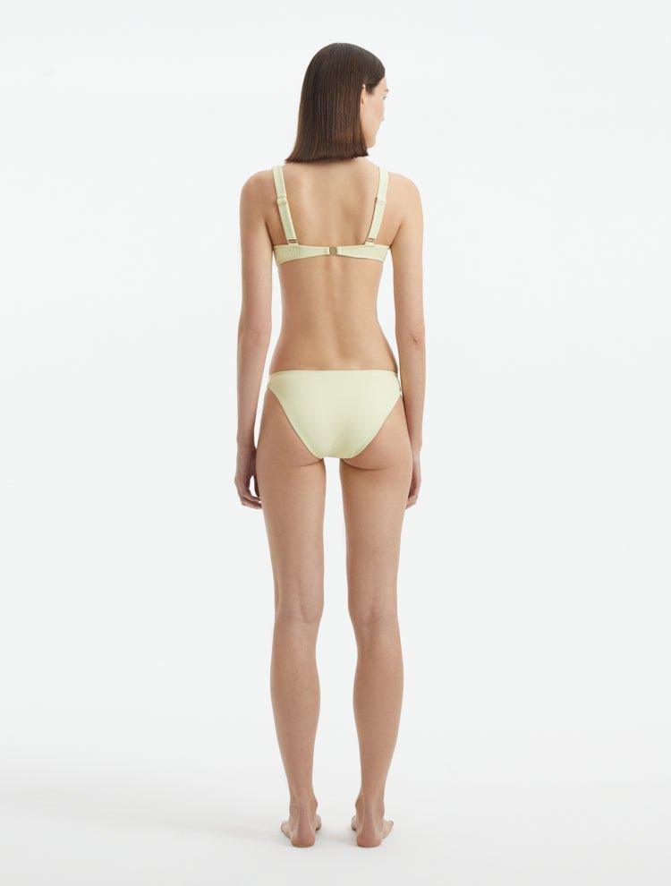 Aeron Yellow V Neck Textured Bikini Top | Moeva | Bikini Top | Each week unveils new pieces—luxury swimwear, fluid resort silhouettes, and elevated summer-to-evening essentials designed to carry you from coastal escapes to city nights.