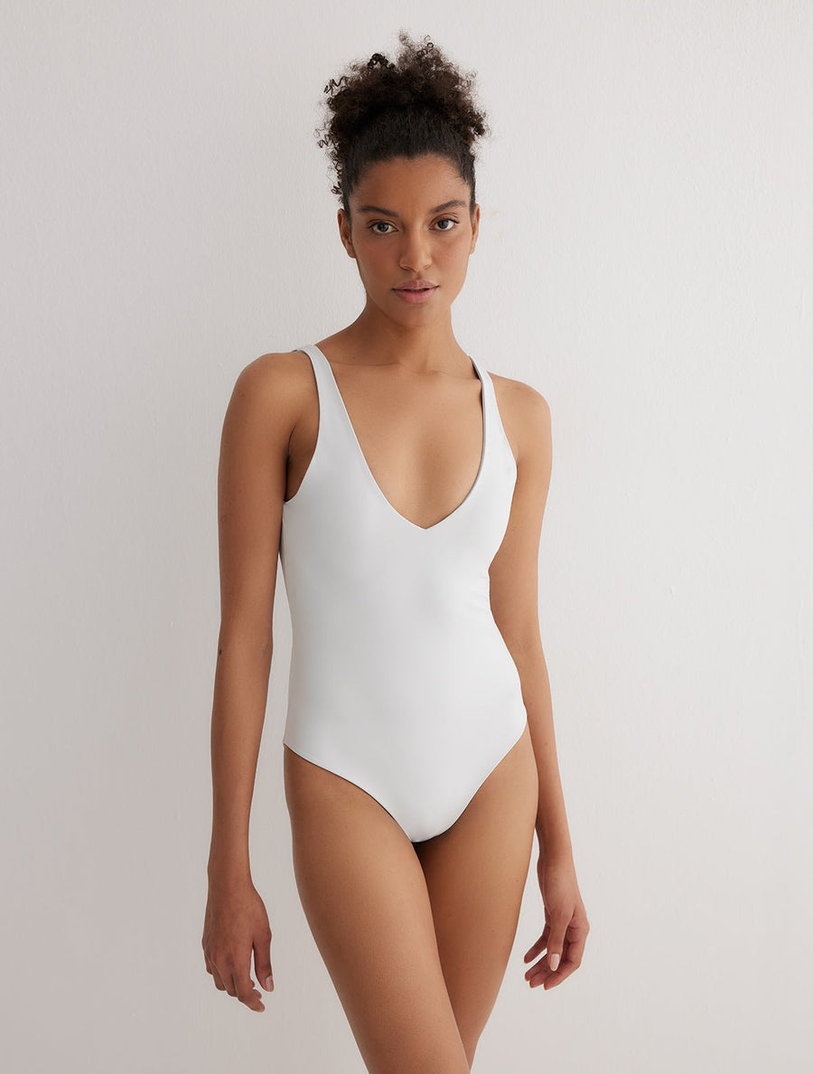 Front View: Model in Agneta Grey/White Reversible Bodysuit - French & Italian Fabric, Special Lycra Xtralife Certificate, Stretchy Fabric, MOEVA Luxury Swimwear