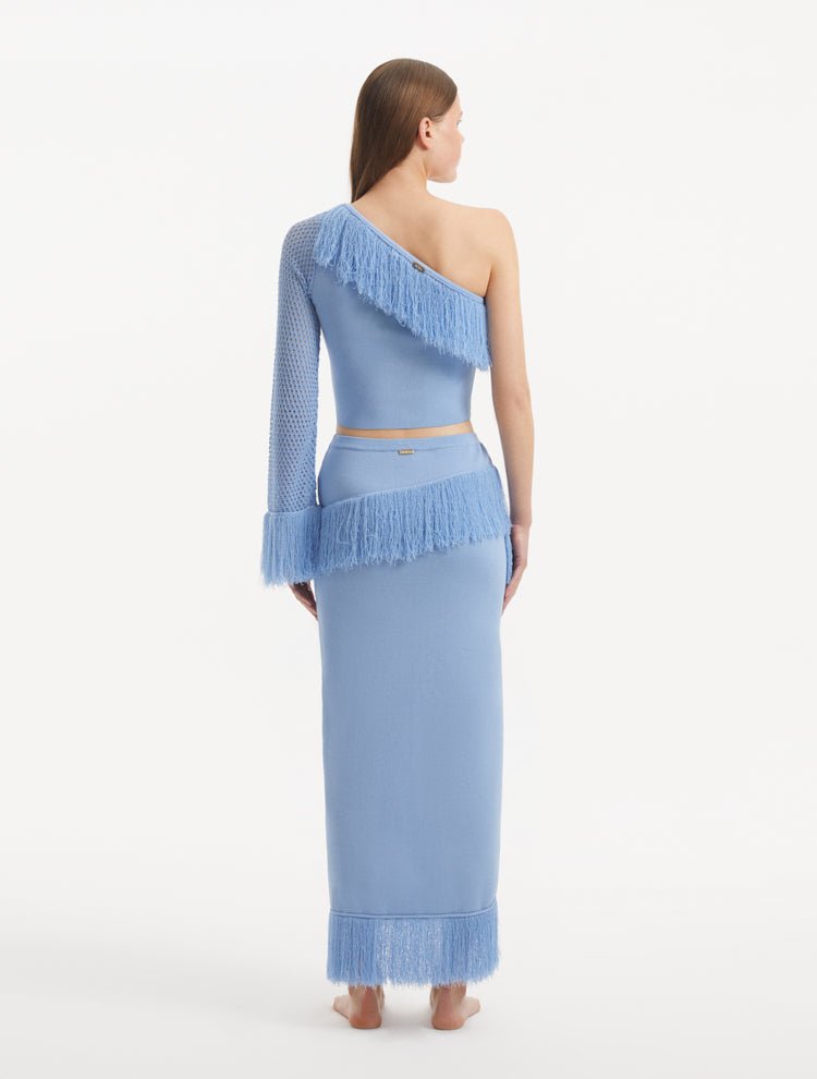 "Back view of the Alani Baby Blue Skirt, illustrating the high-waisted fit and elastic waistband for a comfortable and flattering silhouette."