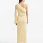 "Back view of the Alani Yellow Skirt, featuring the high-waisted design and showcasing the elegant drape of the knit fabric."