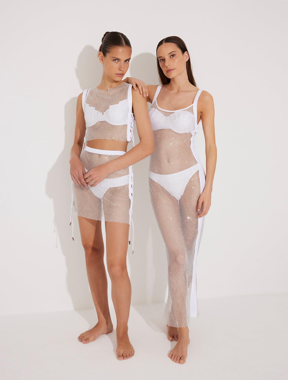 "Models posing in Alejandra Top and  Skirt from the front, highlighting the shimmering rhinestones and adjustable ties."